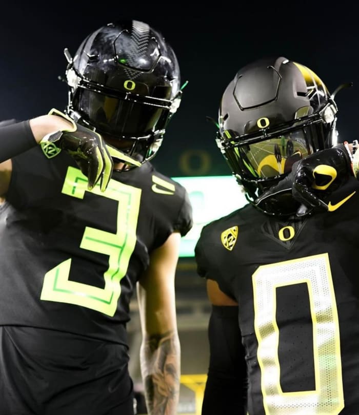 Kyler Kasper poses with Oregon CB Cole Martin during a visit to Eugene inside Autzen Stadium.